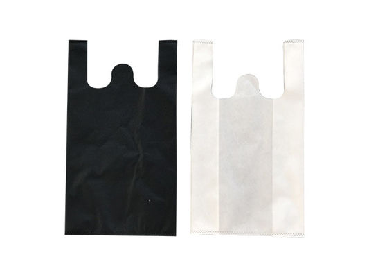 Fully automatic non-woven cross-cutting and ironing bag-making machine with online handle attachings